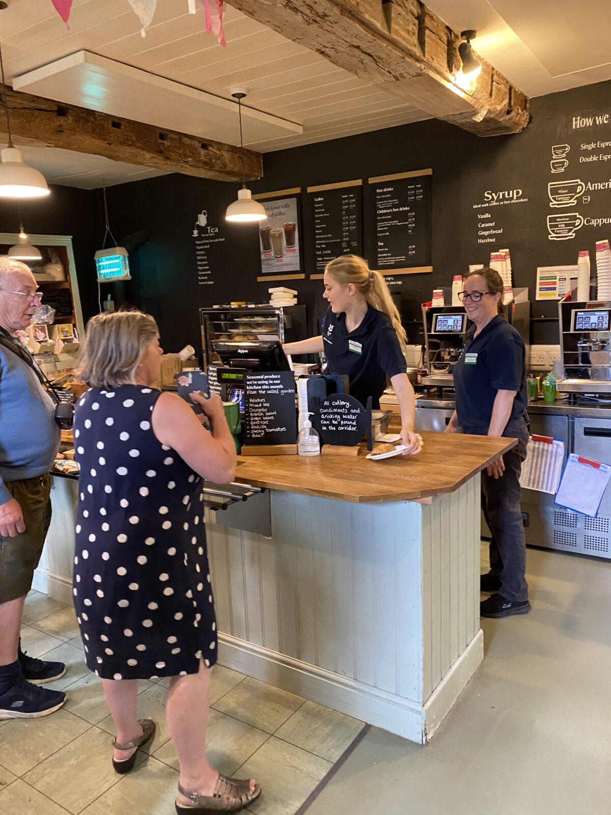 Claudia serves up scones to hungry customers. 